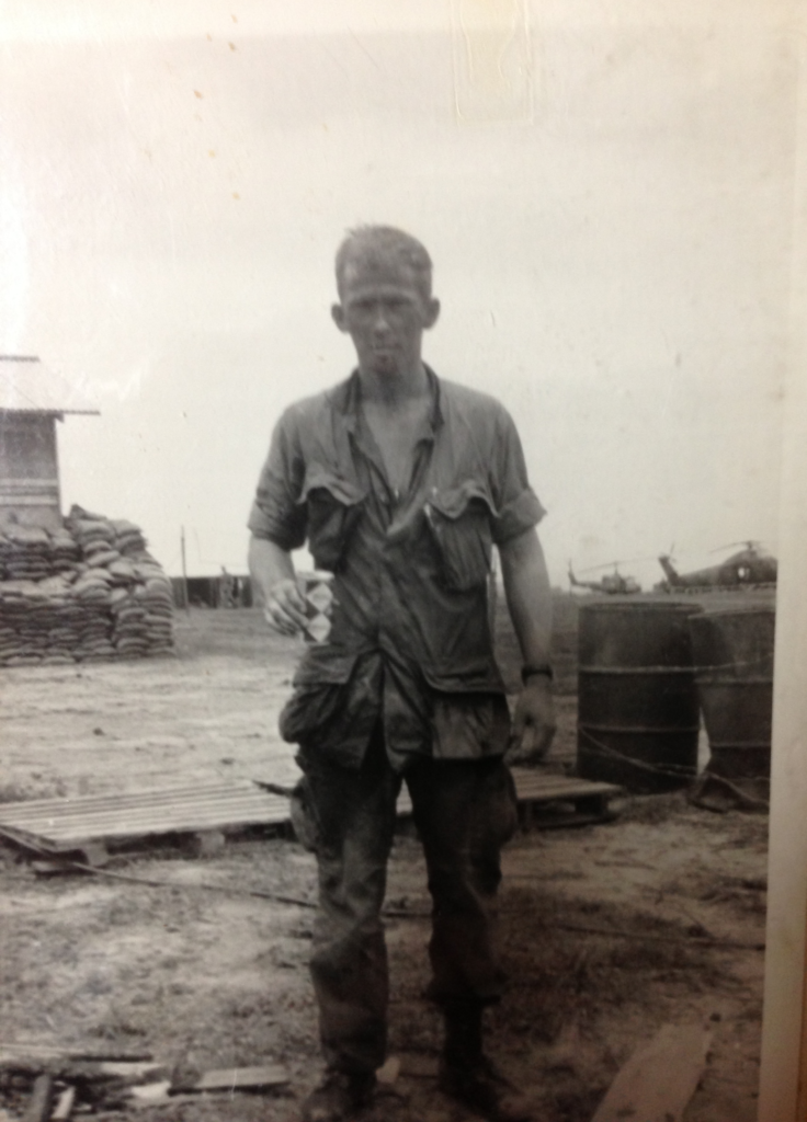 Lieutenant Henry Thompson at the Quang Tri, Vietnam, launch site just after returning from the Christmas mission. Covered with mud and blood and enjoying a cold Coke before being debriefed. Photo courtesy of Henry Thompson.