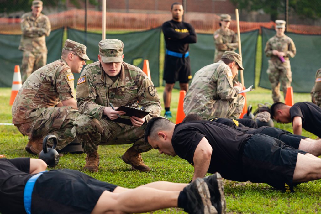U.S. Army Staff Sgt. Gabriel Wright, a signals intelligence analyst with the 780th Military intelligence Brigade, grades the Hand-Release Push-Up event May 17, 2019, as part of Army Combat Fitness Test Level II Grader validation training, held at Fort Meade, Maryland. A mobile training team from Fort Gordon’s Cyber Center of Excellence NCO Academy in Georgia provided the training by teaching, coaching, and administering the ACFT to 114 NCOs. Photo by Sgt. 1st Class Osvaldo Equite/U.S. Army/Released.