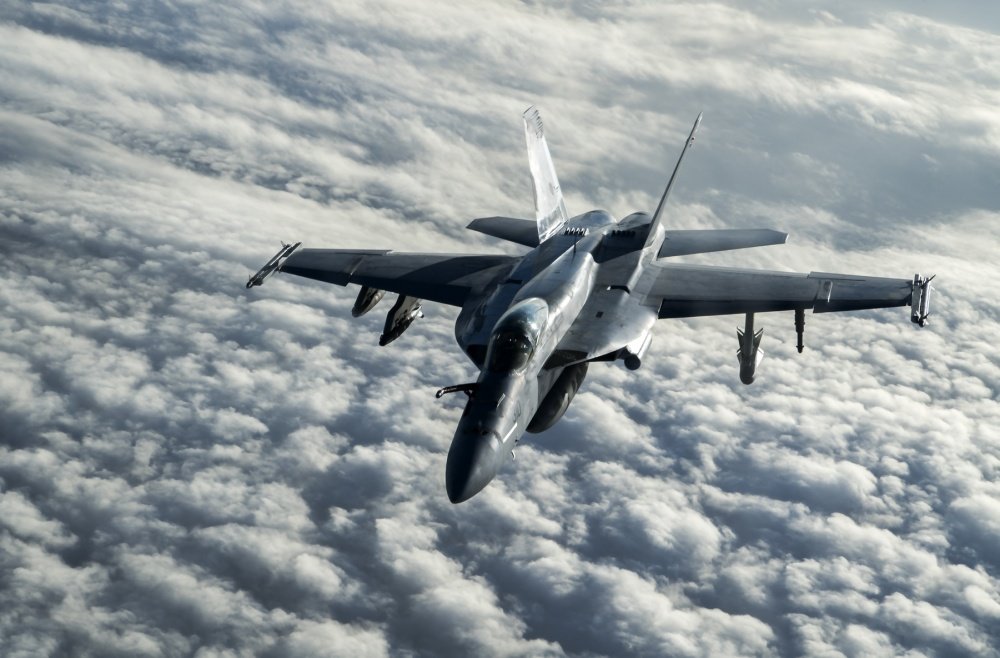 A U.S. Navy F/A-18E Super Hornet flies over Afghanistan, Jan. 23, 2020. The F/A-18E is the Navy’s primary strike and air superiority aircraft providing force projection, interdiction, and close and deep air support. U.S. Air Force photo by Staff Sgt. Matthew Lotz via DVIDS.