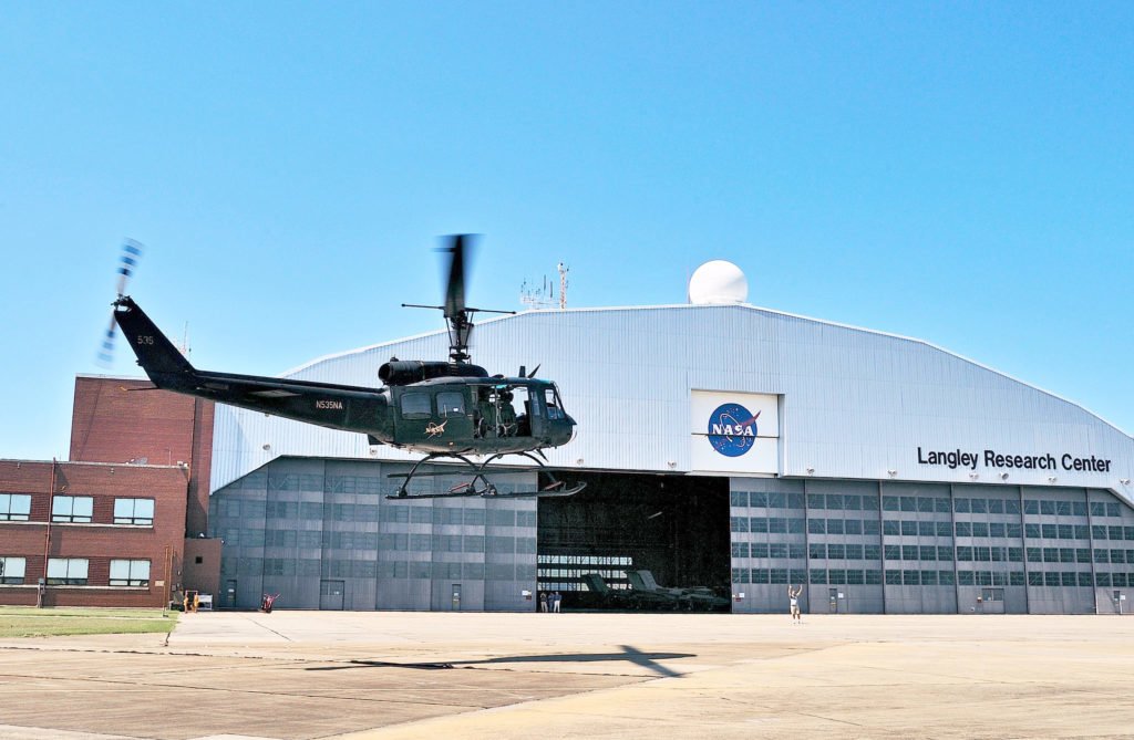 NASA Langley's Bell UH-1H Huey helicopter returns to the Center after a five-year long stint supporting space shuttle operations at Kennedy Space Center. Photo courtesy of NASA/George Homich.