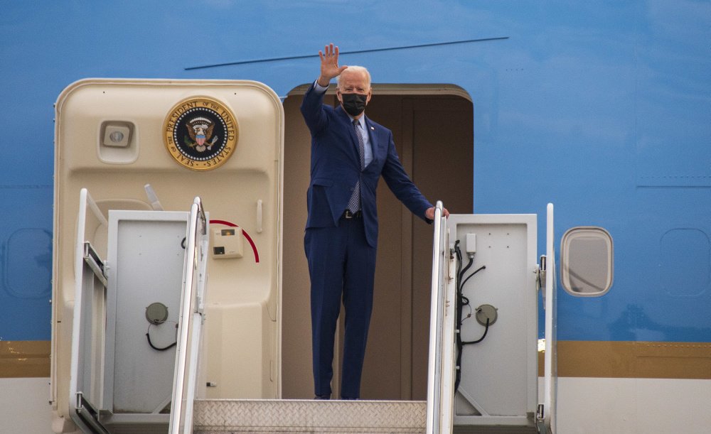 President Joe Biden waves to onlookers before boarding Air Force One at Dobbins Air Reserve Base, Ga on April 29, 2021. U.S. Air Force photo by Andrew Park via DVIDS.