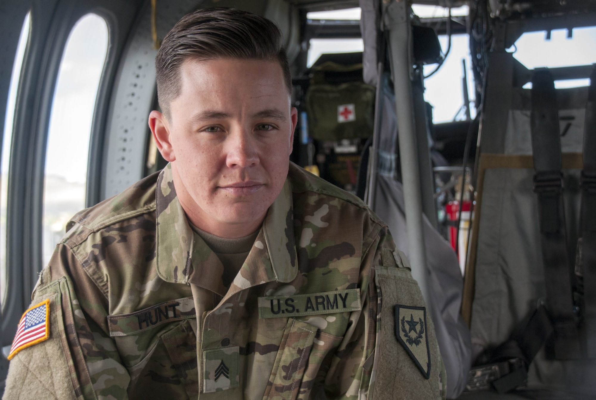 Nevada Army National Guard Sgt. Sam Hunt, an electrician with G Company, 2/238th General Support Aviation Battalion, on the flight line at the Army Aviation Support Facility in Stead, Nev., May 12, 2017. Hunt is the first openly transgender soldier of the Nevada National Guard.