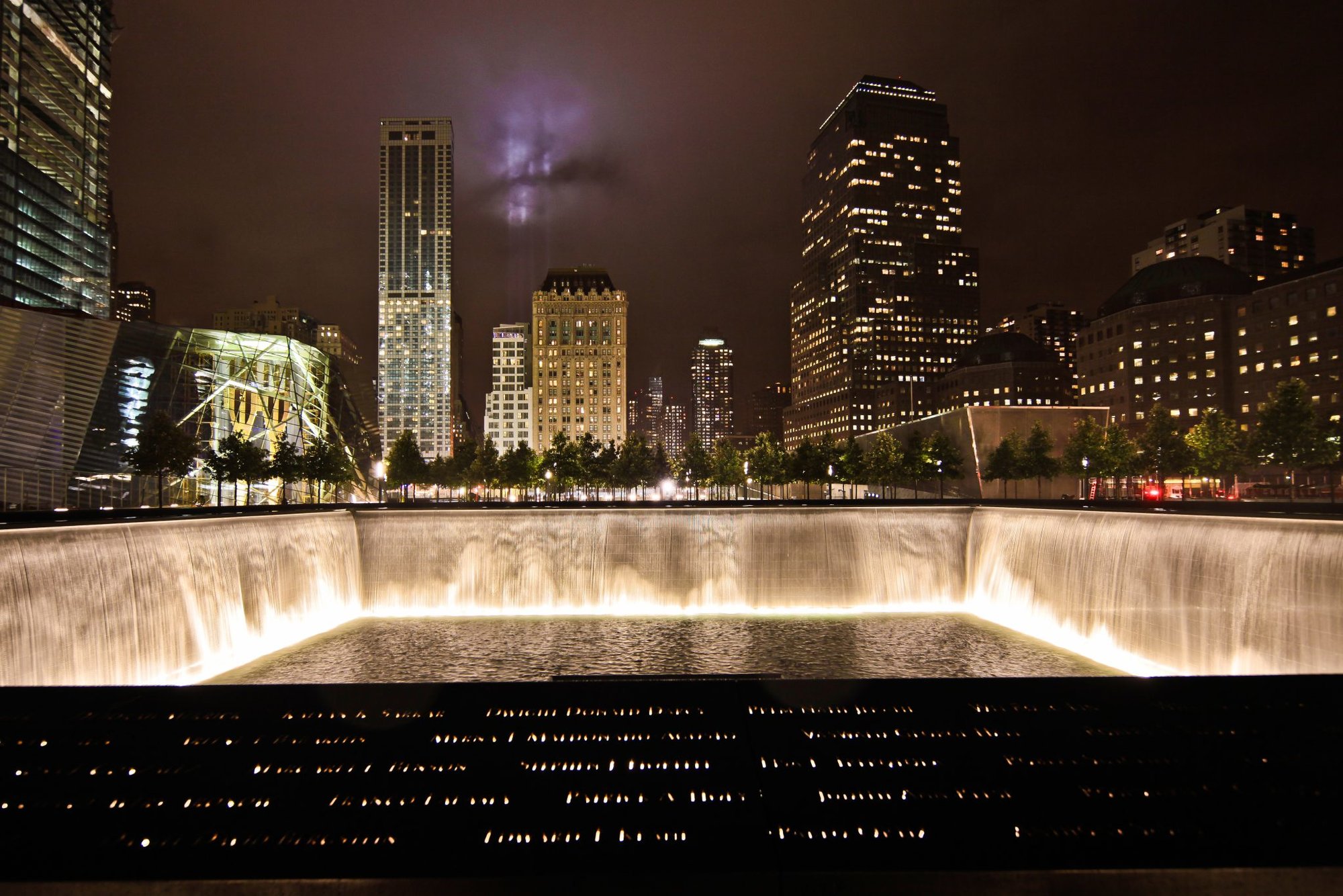9/11 Memorial and pool at night. Photo by Joe Woolhead, courtesy of the 9/11 Memorial.