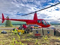National Set Medics delivers crew, including Elizabeth “Beth” Hammons, and supplies to an Alaska base camp during the 2018 filming of “Frozen and Afraid,” an episode of Naked and Afraid. Photo courtesy of National Set Medics.