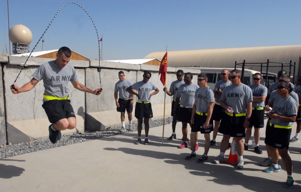 U.S. Army Spc. Drake Waters with Bravo Company, 702nd Brigade Support Battalion, 4th Brigade Combat Team, 2nd Infantry Division, competes in the jump rope event during the battalion's mid-tour celebration March 17, 2013, at Kandahar Airfield, Afghanistan. U.S. Army photo by Staff Sgt. Scott Tynes/Released.