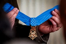 A Medal of Honor is held in the East Room of the White House before being awarded to retired Army Col. Paris Davis, March 3, 2023, in Washington. President Joe Biden is awarding the Medal of Honor to an Army pilot from the Vietnam War who risked his life to rescue a reconnaissance team that was about to be overrun by the enemy, facing almost certain death. Biden is recognizing Larry Taylor of Signal Mountain, Tennessee, at a White House ceremony on Tuesday, Sept. 5, 2023. AP file photo by Evan Vucci.