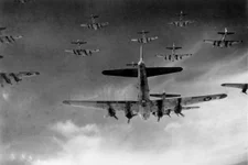 B-17 Flying Fortresses from the 398th Bombardment Group fly a bombing mission to Neumünster, Germany, April 13, 1945. Photo courtesy of U.S. Air Force.