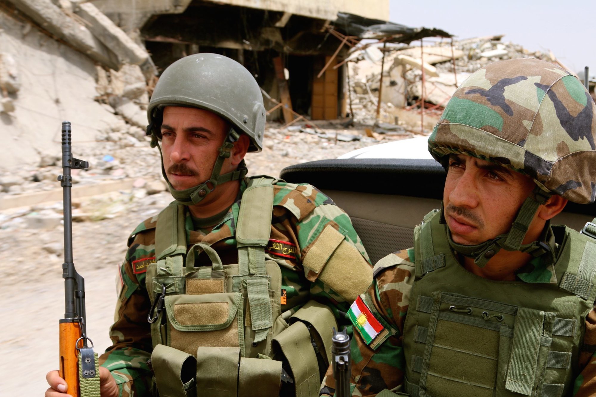 Peshmerga soldiers on patrol in Sinjar, Iraq, following the defeat of ISIS. Photo by Nolan Peterson/Coffee or Die.