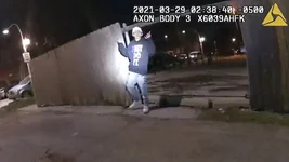 This image from Chicago Police Department body-cam video shows the moment before Chicago Police Officer Eric Stillman fatally shot Adam Toledo, 13, on March 29, 2021, in Chicago. Chicago Police Department via AP.