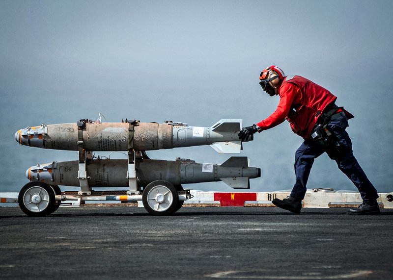 Red shirts aircraft carrier, aircrew colored shirts