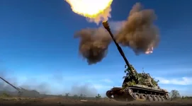 This photo taken from video released by Russian Defense Ministry Press Service on Monday, June 5, 2023, shows a Russian self-propelled gun firing toward Ukrainian positions at an undisclosed location. Russian Defense Ministry Press Service photo via AP.