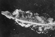 The Japanese battleship Yamato is hit by a bomb in the Sibuyan Sea, Oct. 24, 1944. U.S. Navy photo.