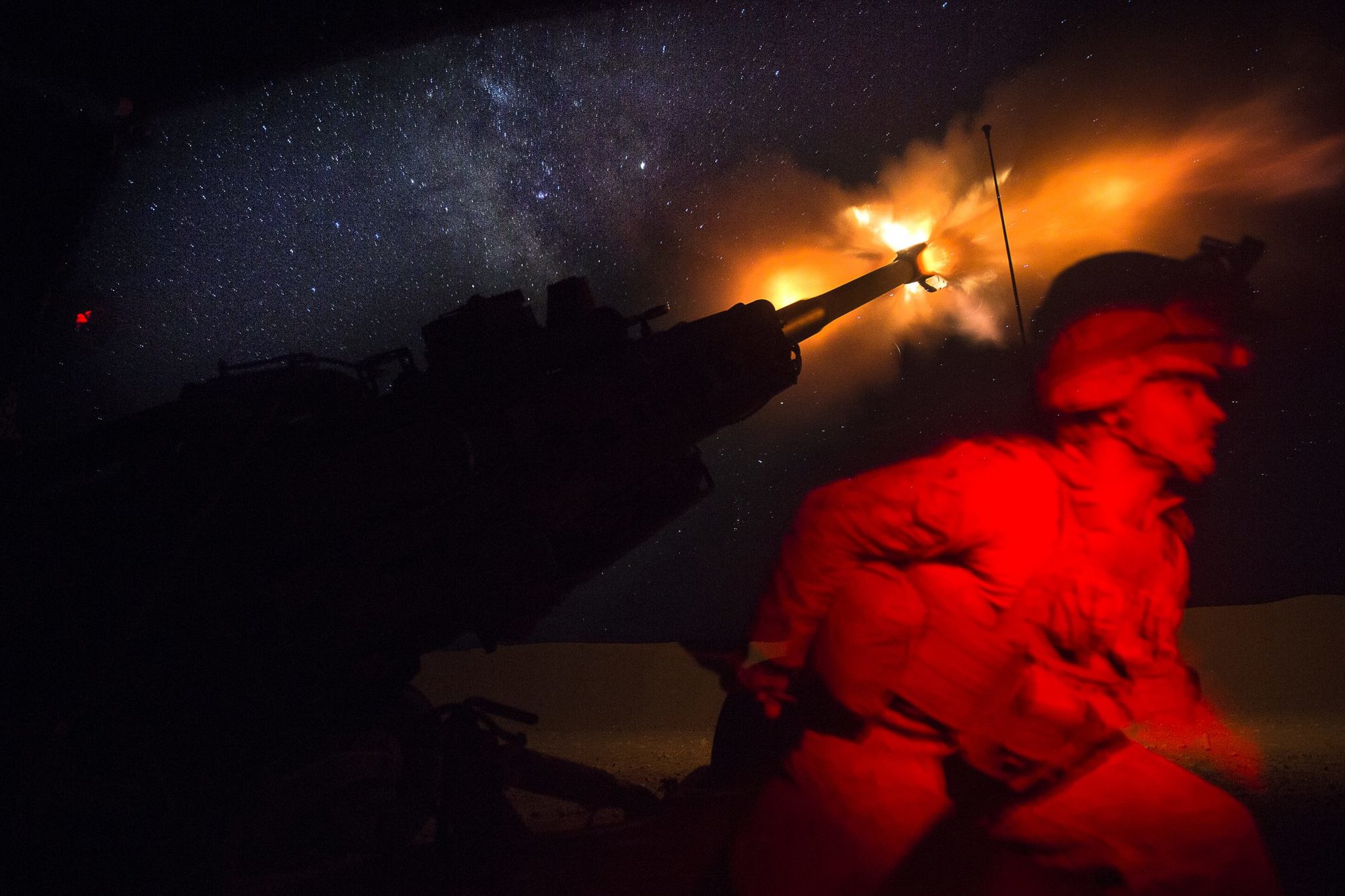 UNDISCLOSED LOCATION, SYRIA (June 3, 2017)— A U.S. Marine fires an M777-A2 Howitzer in the early morning in Syria, June 3, 2017. They have been conducting 24-hour all-weather fire support for the Coalition’s local partners, the Syrian Democratic Forces, as part of Combined Joint Task Force-Operation Inherent Resolve. CJTF-OIR is the global coalition to defeat ISIS in Iraq and Syria. (U.S. Marine Corps photo by Sgt. Matthew Callahan)