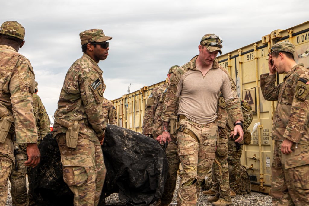 Members of 1-24's Barbarian Company drop off equipment in Erbil during one of several trips during their pullback from Mosul in March. Photo by Kevin Knodell/Coffee or Die.