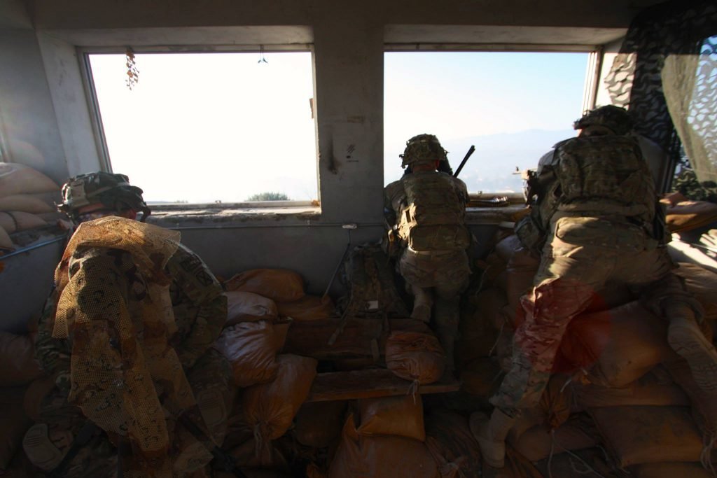 U.S. Army soldiers man a sniper position in Afghanistan in 2013. Photo by Nolan Peterson/Coffee or Die.