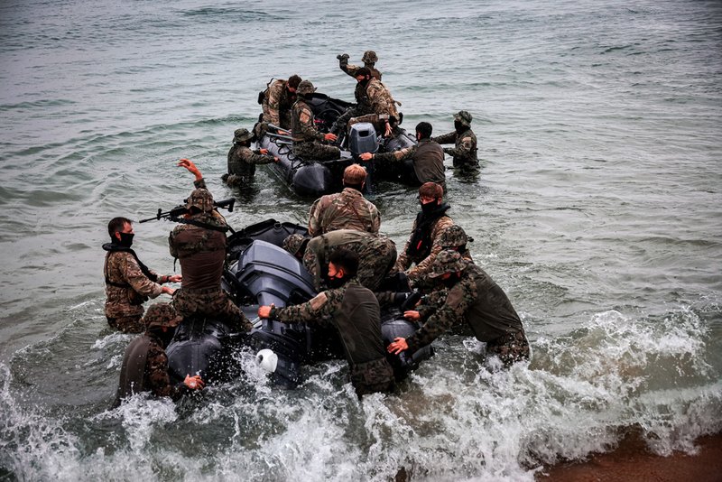 Members of U.S. Special Operations Command Korea and South Korea's Army Special Warfare Command take part in a joint maritime infiltration training