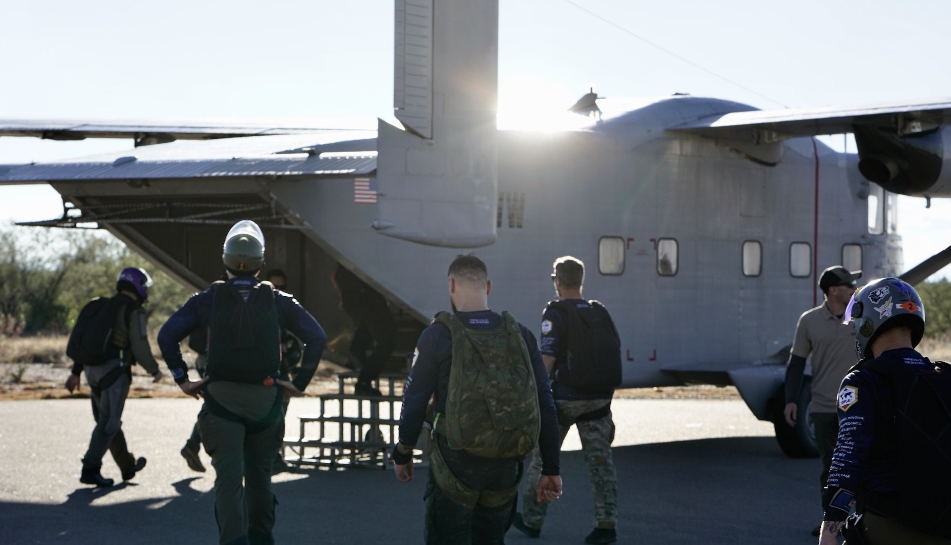 The Triple 7 Expedition team loads onto an airplane at Complete Parachute Solutions in Coolidge, Arizona, in December 2022. Legacy Expeditions photo.