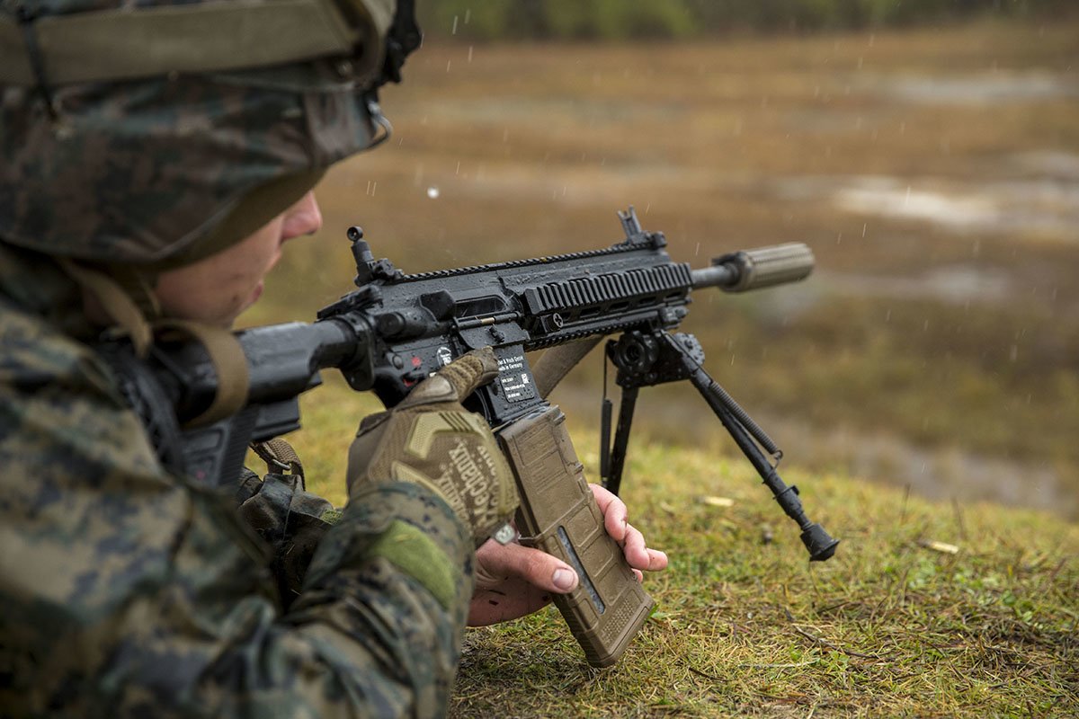 U.S. Marines with 3rd Battalion 8th Marine Regiment fire the M27 Infantry Automatic Rifle during a live-fire weapons exercise at range F-18 on Camp Lejeune, N.C., Dec. 8, 2017. The M27 has been introduced to different units throughout the Marine Corps within the last six months. Photo by Lance Cpl. Michaela R. Gregory/U.S. Marine Corps, Released.