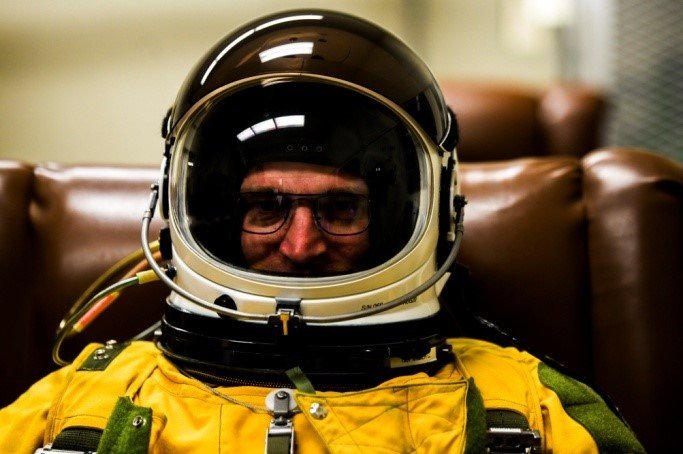 U.S. Air Force Maj. Jeffrey Anderson, 99th Reconnaissance Squadron pilot, receives suit preparations at Beale Air Force Base, California, May 5, 2020. Before flights, pilots go through pre-flight checks to make sure their pressure suits are able to respond during extreme conditions and high altitude flights. Photo by Senior Airman Colville McFee/U.S. Air Force.