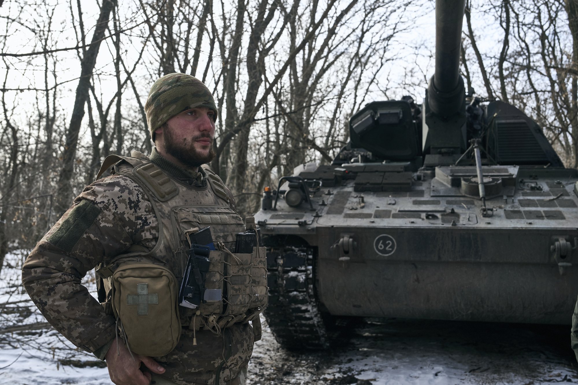 A Ukrainian soldier stands in his position on the frontline close to Bakhmut, Donetsk region, Ukraine, Thursday, Feb. 9, 2023. (AP Photo/Libkos)