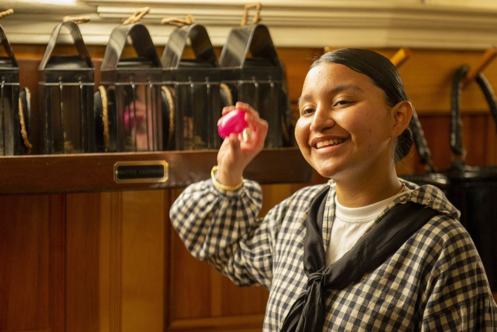 BOSTON (April 4, 2021) Aviation Structural Mechanic Seaman Jennifer Martinez gives a virtual tour and Easter egg hunt aboard USS Constitution. Photo by U.S. Navy Mass Communication Specialist 3rd Class Alec Kramer.