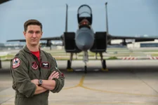 U.S. Air Force Capt. Cole Holloway a pilot from the 67th Fighter Squadron, stands in front of an F-15C Eagle Dec. 14, 2018, on Kadena Air Base, Japan. After following in his father’s footsteps and accomplishing his childhood dream of becoming a pilot, Holloway found out he had amyotrophic lateral sclerosis (ALS). Despite his terminal illness and being medically retired from the Air Force, Holloway maintains a positive outlook and is looking forward to the next chapter in his life. (U.S. Air Force photo by Staff Sgt. Micaiah Anthony)