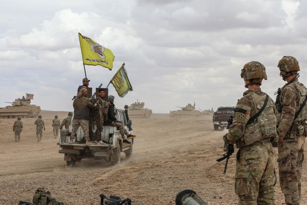 Syrian Democratic Forces, SDF, conduct a live fire exercise alongside U.S Soldiers in Syria on March 25, 2022. Photo by Spc. William Gore via DVIDS.