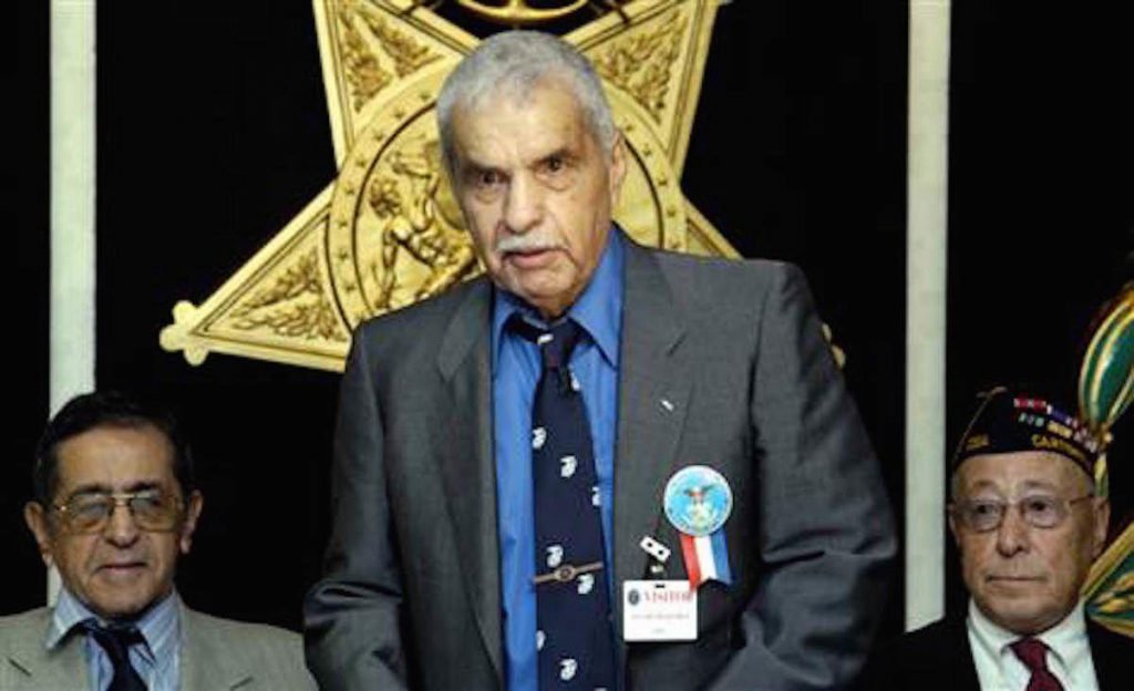 Marine veteran Guy Gabaldon speaks about his war experiences Sept. 15, 2004, at a Pentagon ceremony honoring Hispanic World War II veterans.