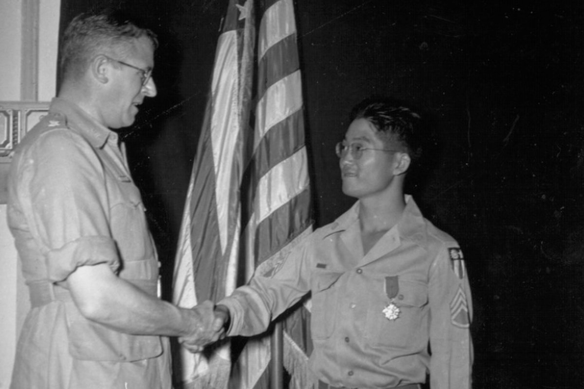 General Frank Merrill of the famed Merrill’s Marauders congratulating S/Sgt Roy Matsumoto for earning the Legion of Merit award, photo courtesy of Densho Digital Repository.