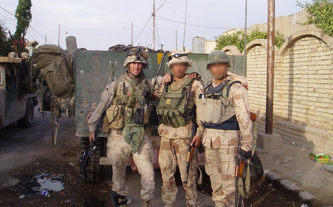 Iscol with some of his Iraqi brothers in 2004. Photo courtesy of Zach Iscol