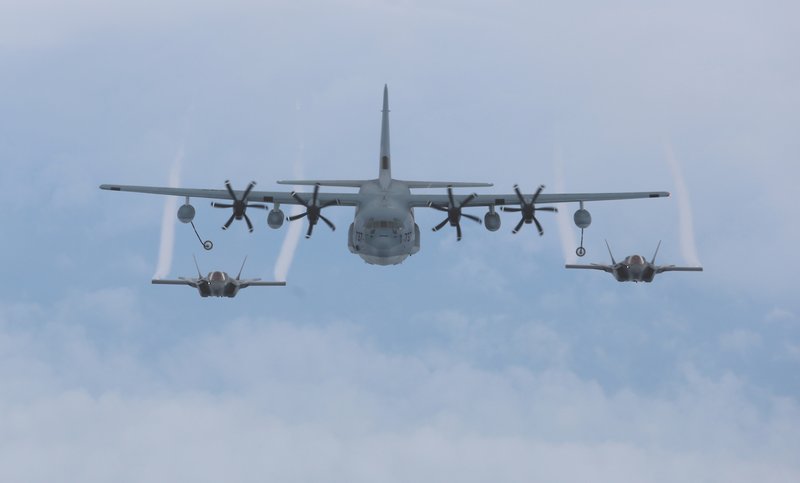 KC-130 performs mid-air refueling, Raider Five Zero