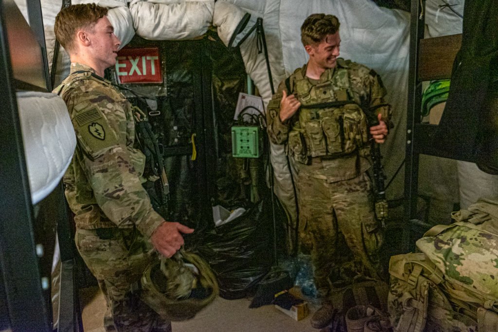 Members of Barbarian Company's scout platoon prepare for a late night of guard duty at Erbil Airport. Photo by Kevin Knodell/Coffee or Die.