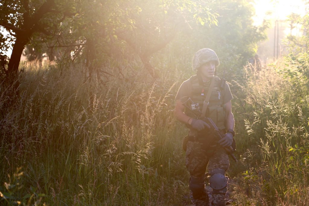 A Ukrainian soldier on patrol in the front-line town of Pisky in 2015.