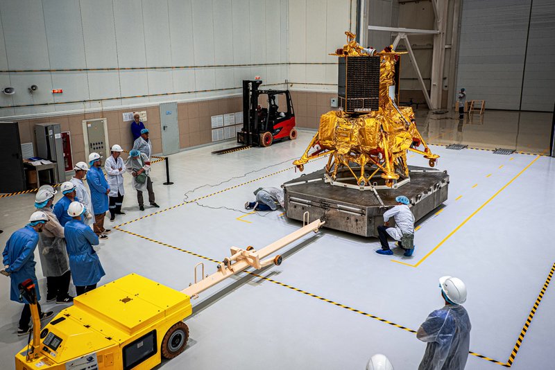 The moon lander Luna-25 automatic station is seen inside a plant shop