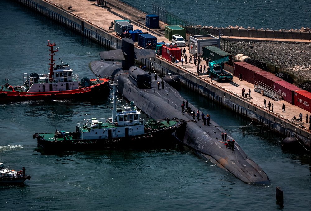 The nuclear-powered submarine USS Michigan approaches a naval base in Busan, South Korea.