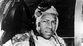 This circa 1950 photo provided by the US. Navy shows Jesse Brown in the cockpit of an F4U-4 Corsair fighter at an unidentified location. FedEx founder Fred Smith has donated the proceeds from the film “Devotion,” which he financed, that tells the story of groundbreaking Naval aviators Brown and Thomas Hudner. The proceeds will fund in part scholarships for the children of Navy service members studying STEM. US Navy via AP.