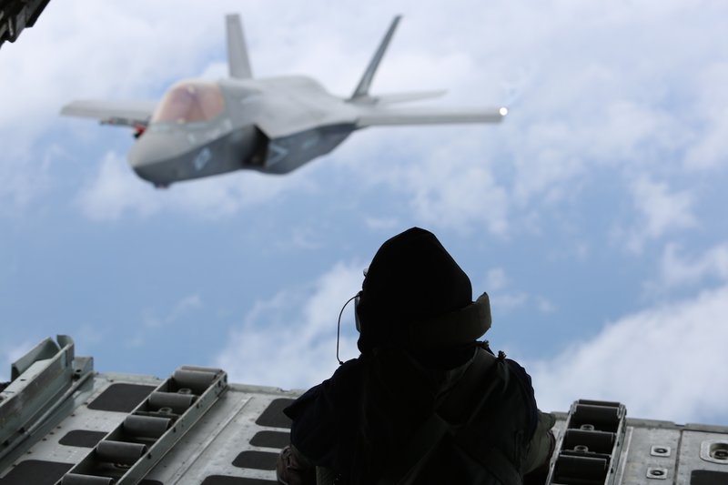KC-130 performs mid-air refueling
