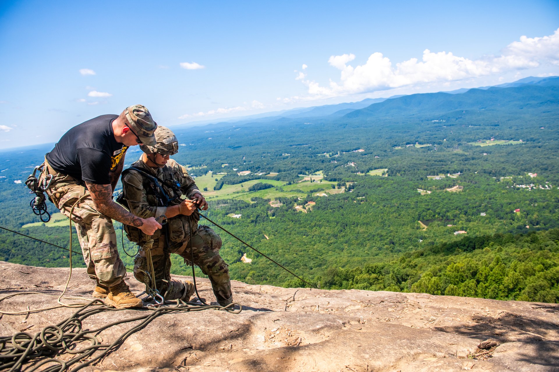 A Ranger instructor talks a student into a belay position during a two-day exercise at Mount Yonah during the Mountain Phase of Ranger School. Two soldiers were killed and three injured on the mountain Monday, Aug. 9, 2022. US Army photo by Patrick A. Albright.