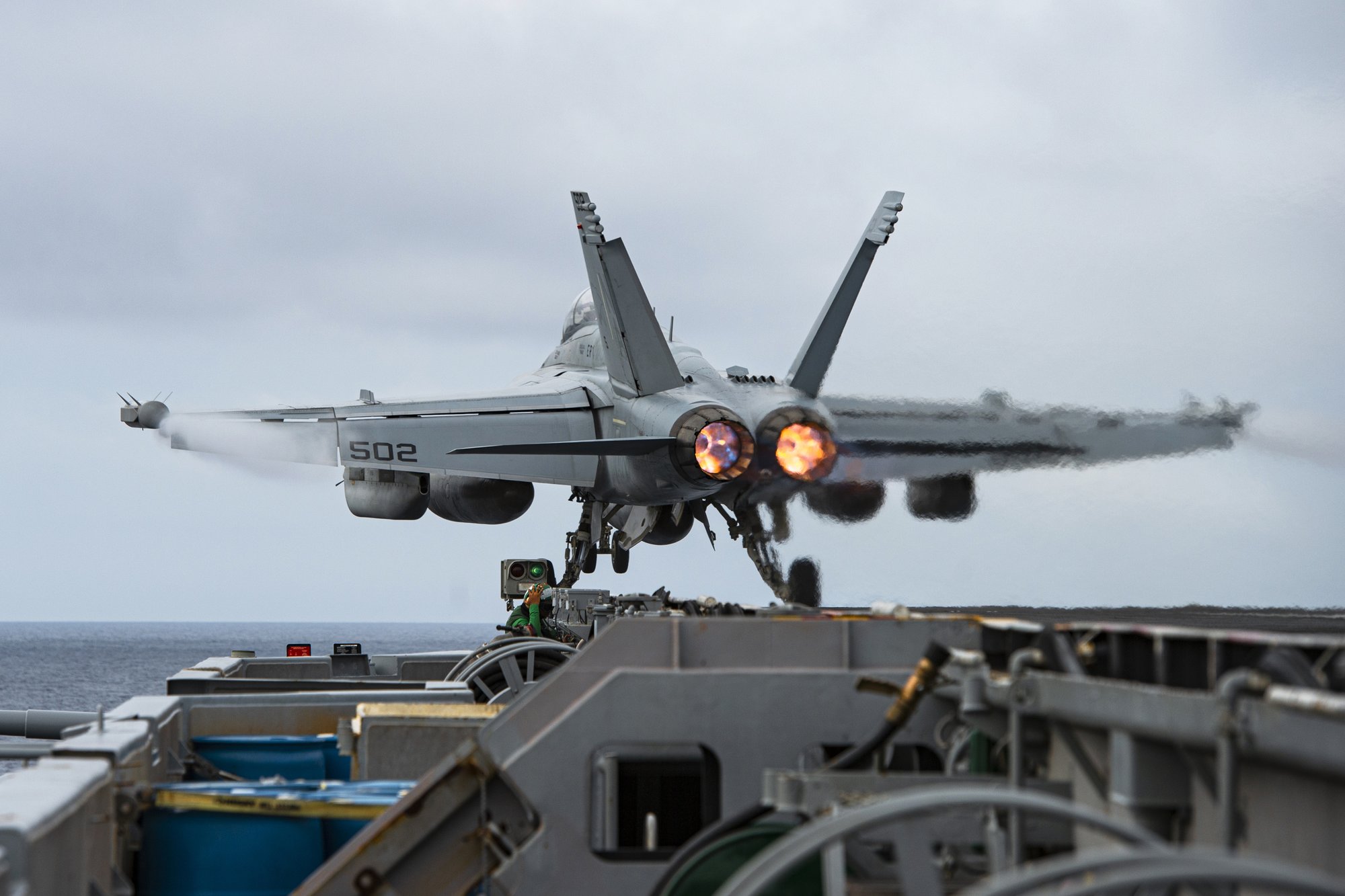 An E/A-18G Growler aircraft launches from the flight deck of the aircraft carrier USS Nimitz in the South China Sea, Sunday, Feb. 12, 2023, as Nimitz in U.S. 7th Fleet was conducting operations. The 7th Fleet based in Japan said Sunday that the USS Nimitz aircraft carrier strike group and the 13th Marine Expeditionary Unit have been conducting “integrated expeditionary strike force operations” in the South China Sea. (Mass Communication Specialist 3rd Class Joseph Calabrese/U.S. Navy via AP)