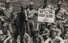 Reckless, a racehorse-turned-war horse who served in the Korean War, pictured with her fellow Marines in 1953. US Marine Corps photo.
