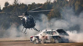 Who would have thought a Little Bird helicopter and a highly modified GL Wagon could perform a synchronized donut? Travis Pastrana and Floyd Ingram did, and they pulled it off on short notice after the scheduled stunt was canceled due to bad weather. Photo courtesy of Hoonigan.