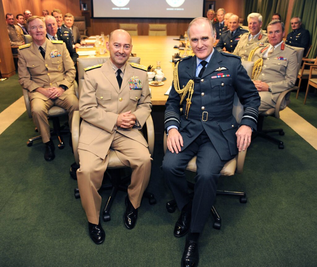Supreme Allied Commander Europe, Adm. James G. Stavridis, front left, is shown with Air Chief Marshal Sir Jock Stirrup, chief of the Defence Staff in the Mountbatten Suite, Ministry of Defence main building London. Stavridis recently published a statement about the use of military forces against protesting Americans. Photo by Mez Merrill/Released, courtesy of DVIDS.