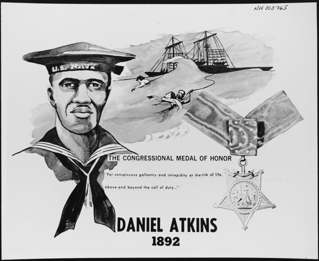 U.S. Navy Poster photographed in 1970. Ship's Cook First Class Daniel Atkins received the Medal of Honor for attempting to save drowning USS Cushing shipmate, Ensign Joseph C. Breckinridge, at sea on 11 February 1898. Note: the correct year of this action was 1898, not 1892 as stated on the photograph. Official U.S. Navy Photograph, from the collections of the Naval History and Heritage Command.