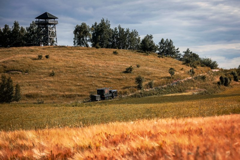 A military truck drives up the hill in Baranowo, Poland.