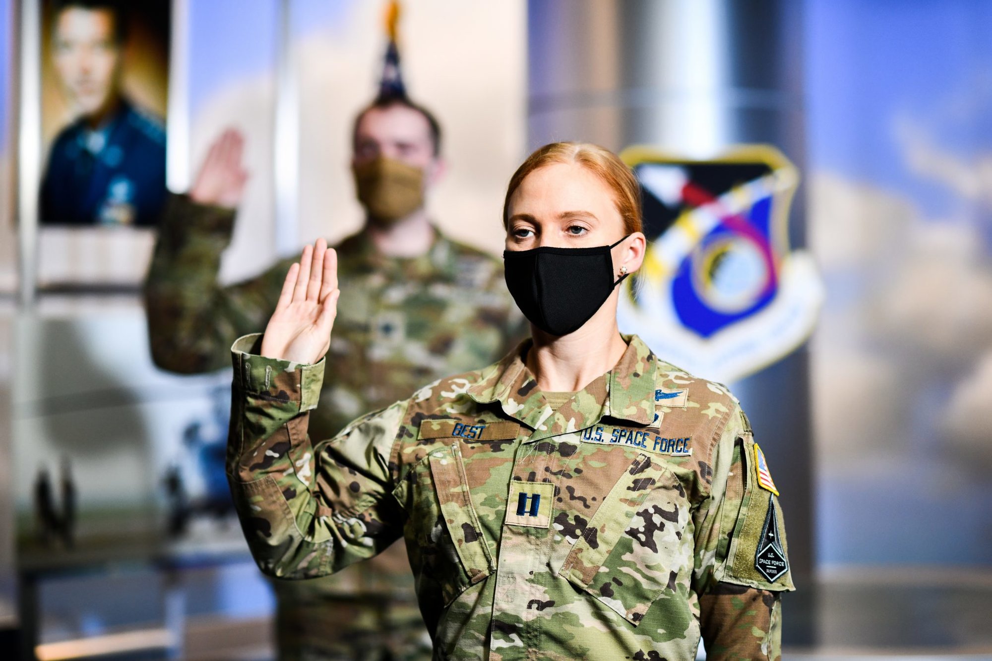 U.S. Space Force Capt. Hannah Best, Space and Missile Systems Center Aide-de-camp to the commander at Los Angeles Air Force Base, California, participates in a ceremonial swearing-in event broadcasted from the Air Force Association’s 2020 Virtual Air, Space and Cyber Conference and administered by Gen. John “Jay” Raymond, United States Space Force Chief of Space Operations, at Los Angeles Air Force Base, California, Sept. 15, 2020. To officially transfer from one military service to another, a military member separates from the current service and commissions or enlists into the new service in their current rank. (U.S. Space Force photo by Van Ha)