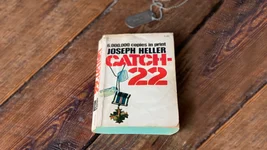 Catch-22 is a satirical war novel published in 1961. It centers on Capt. John Yossarian, an American bombardier during World War II desperately trying to stay alive. Photo by Mac Caltrider/Coffee or Die Magazine.