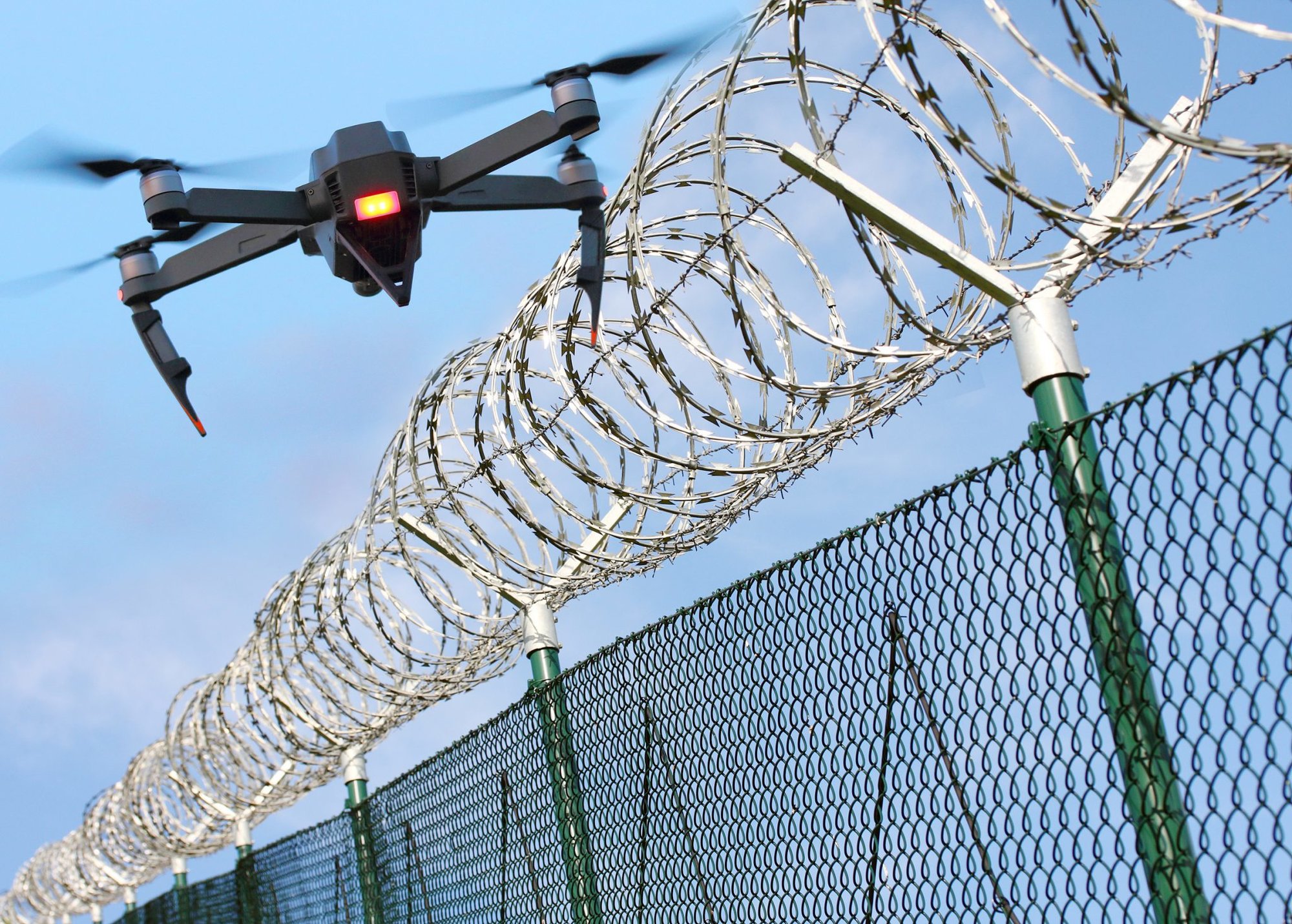 drone prison barbed wire
