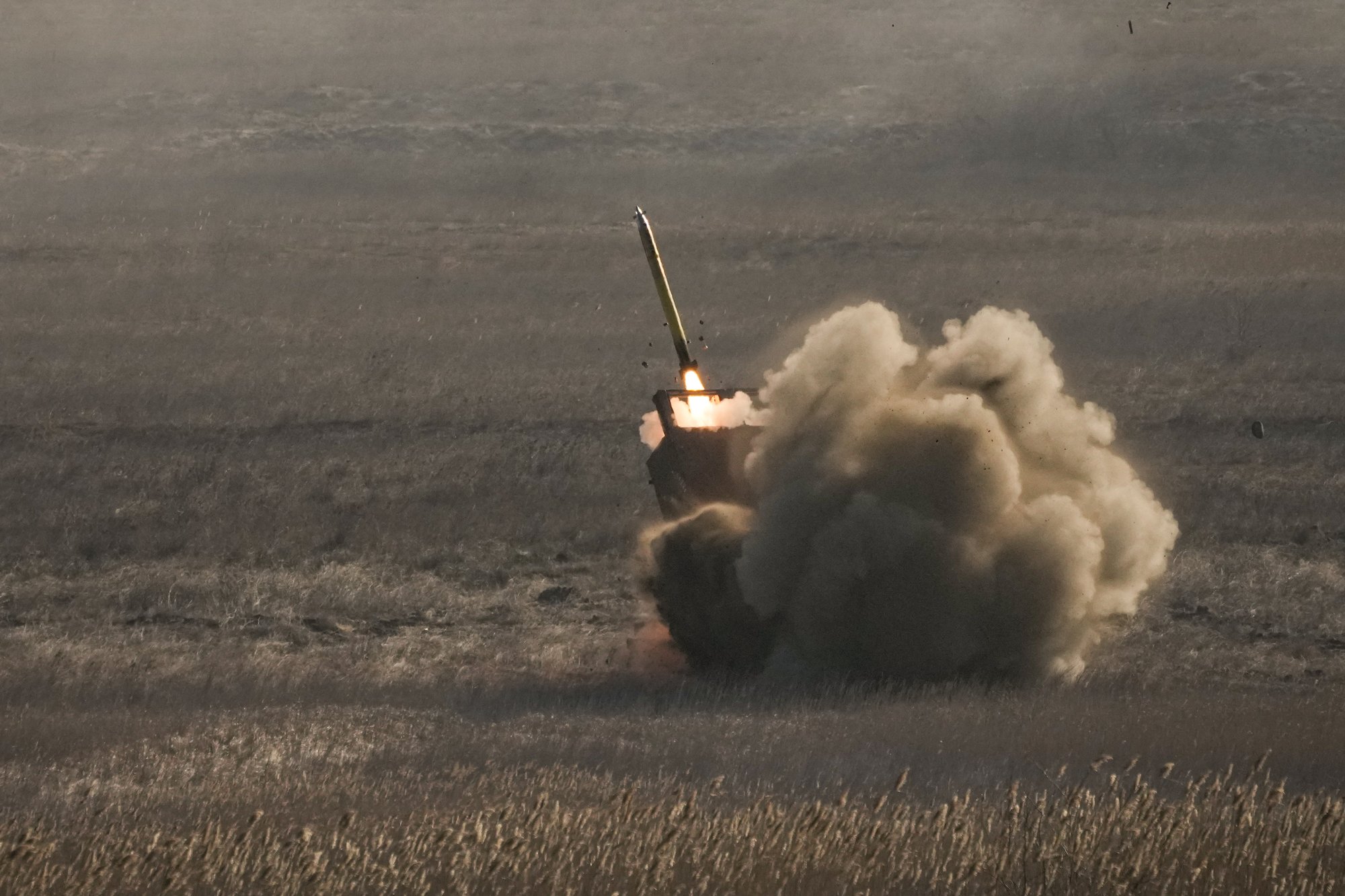 A rocket is launched from a French MLRP system during a joint French US exercise involving HIMARS and MLRP rocket launchers at a firing range in Capu Midia, on the Black Sea shore, Romania, Thursday, Feb. 9, 2023. U.S. and French troops that are part of a NATO battlegroup in Romania held a military exercise on Thursday to test the 30-nation alliance's eastern flank defenses, as Russia's full-scale invasion of neighboring Ukraine nears its one-year anniversary. (AP Photo/Andreea Alexandru)