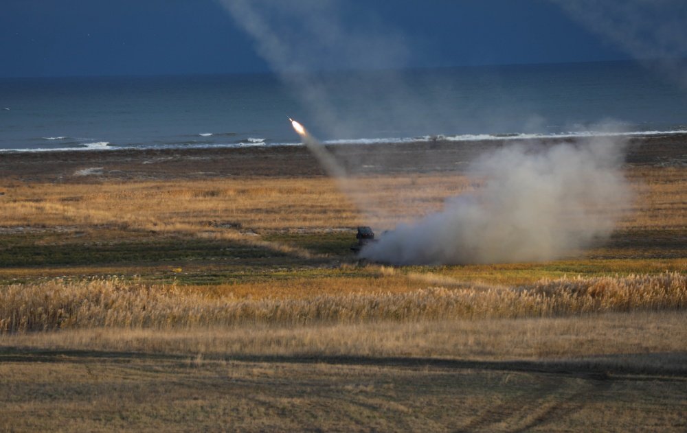 CAPU MIDIA, Romania — A U.S. M142 High Mobility Artillery Rocket Systems deploys its rockets into the Black Sea during Exercise Rapid Falcon Nov. 19, 2020.This was 1st Battalion, 77th Field Artillery Regiment, 41st Field Artillery Brigade’s second live fire event since reactivation just 90 days ago and was the first time U.S. forces ever fired HIMARS from land into the Black Sea in cooperation with Romanian allies. Photo by Sgt. H. Marcus McGill via DVIDS.