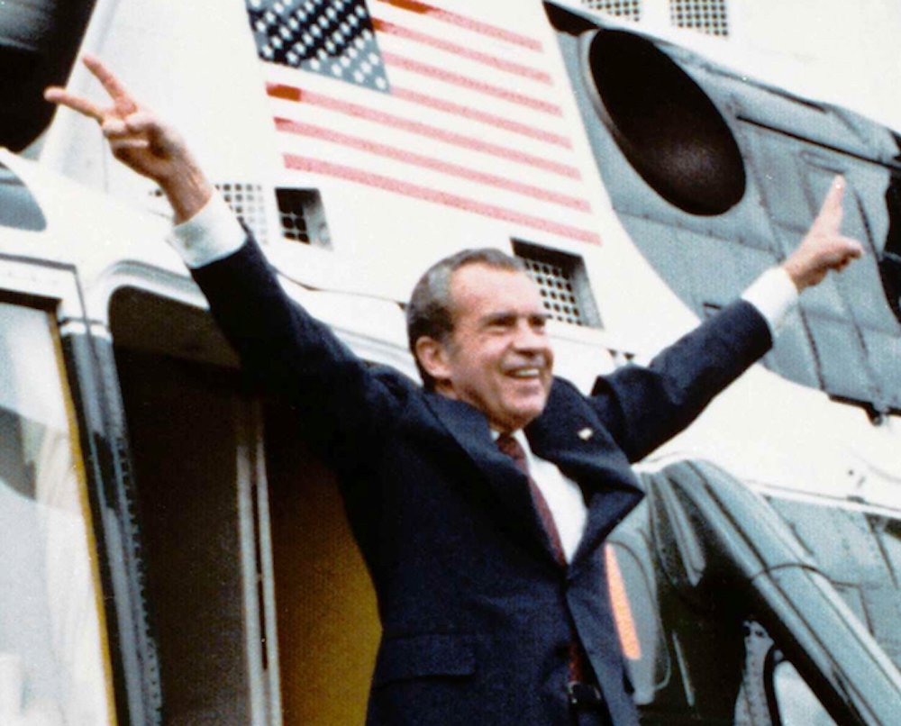 Richard Nixon boards Army One, departing from the White House after resigning the presidency following the Watergate Scandal in 1974. Photo courtesy of Wikimedia Commons.
